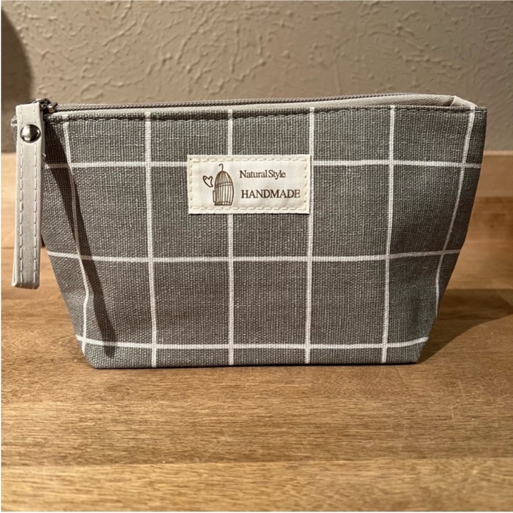 NWT Canvas Makeup Bag. Grey with white stripes.